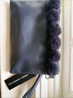 French Connection Black Pom Pom-Trim Wristlet